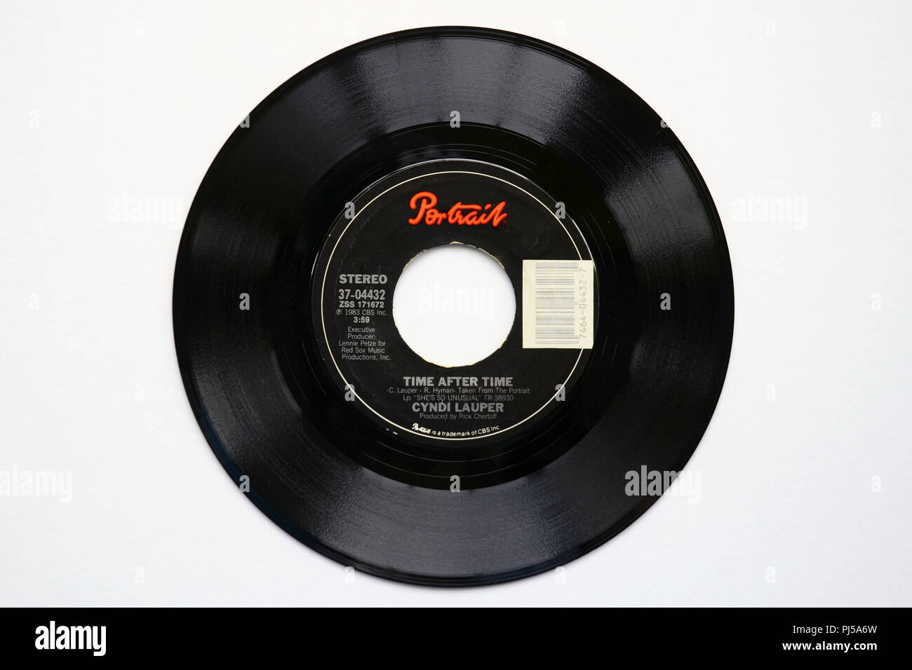 45 RPM vinyl record of Cyndi Lauper's song 'Time after Time' released in 1983 by Portrait Records. Stock Photo