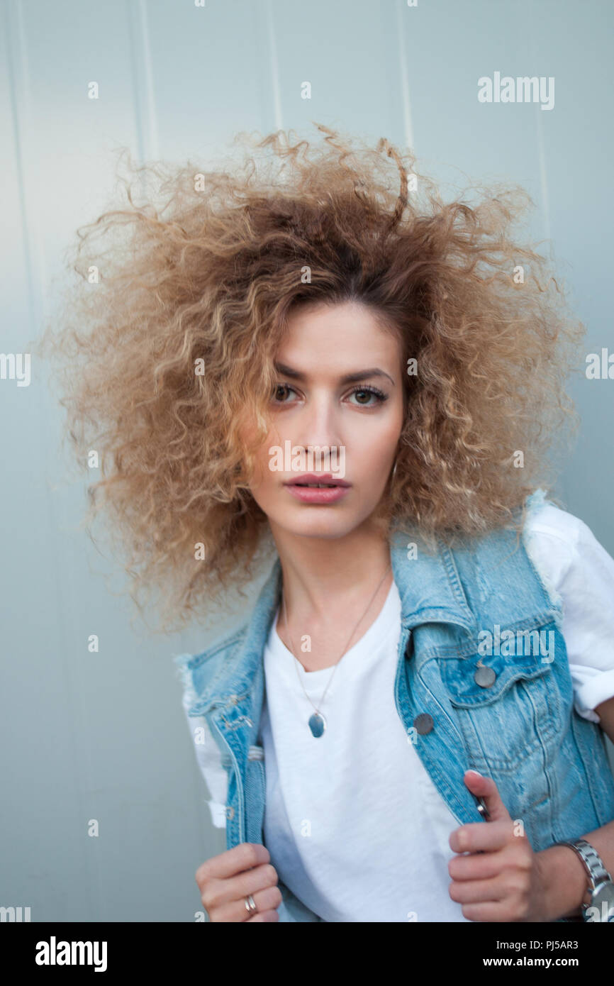 Young Attractive Woman With Very Lush Hair Portrait Of A