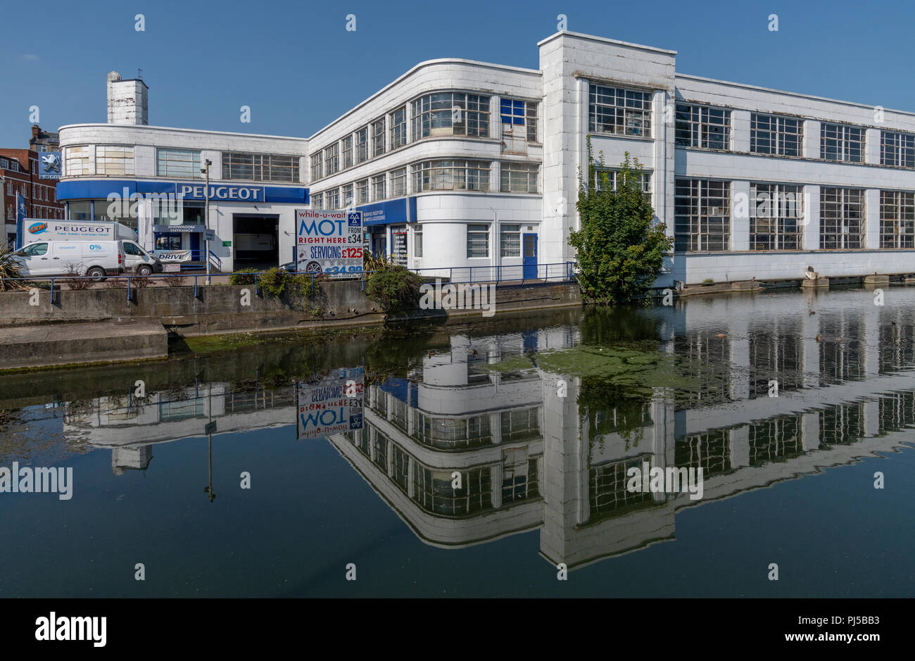 Modernist, Art Deco style car showroom for Rootes built on the River Len in Mill Street, Maidstone. Completed in 1938 by architects Howard and Souser. Stock Photo