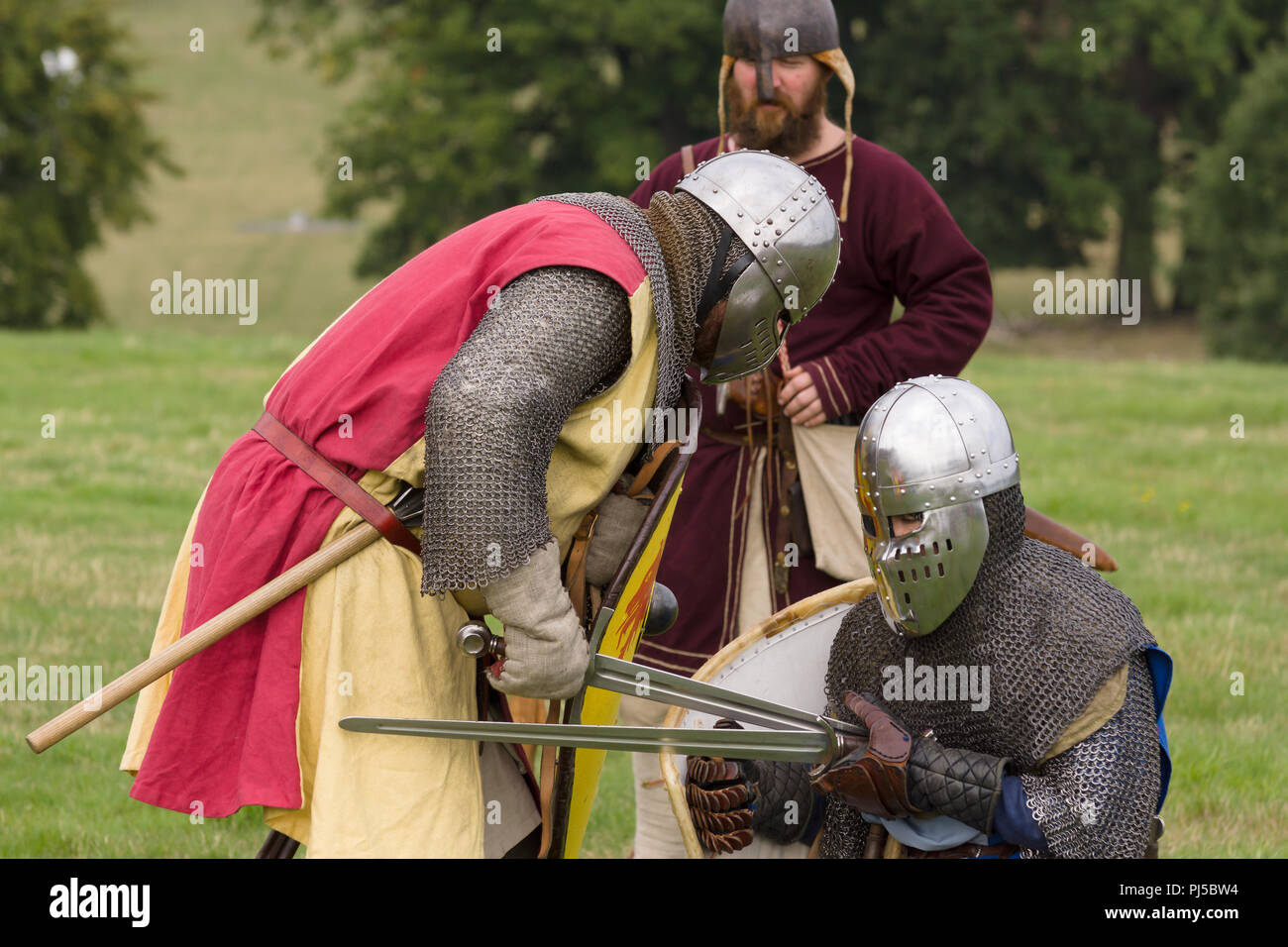 Medieval battle re-enactment of the Cwmwd Ial society re-enacting the battle of Crogen 1165 in Chirk North Wales 2018 Stock Photo