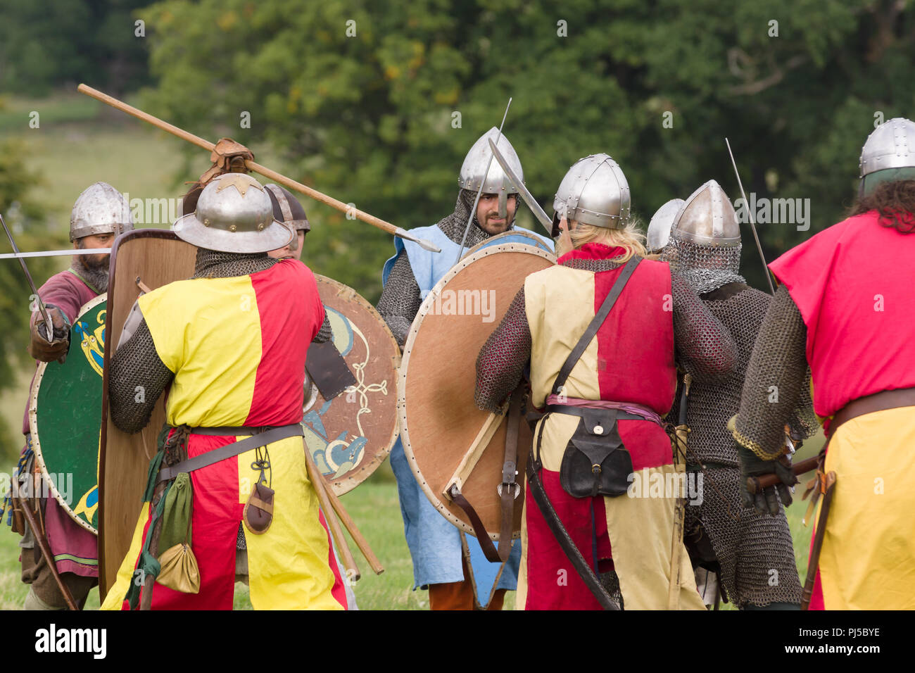 Medieval battle re-enactment of the Cwmwd Ial society re-enacting the battle of Crogen 1165 in Chirk North Wales 2018 Stock Photo