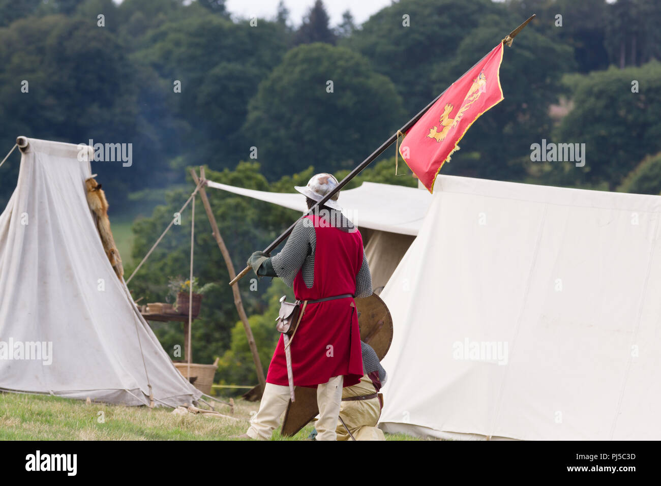 Medieval battle re-enactment of the Cwmwd Ial society re-enacting the battle of Crogen 1165 in Chirk North Wales 2018 Stock Photo