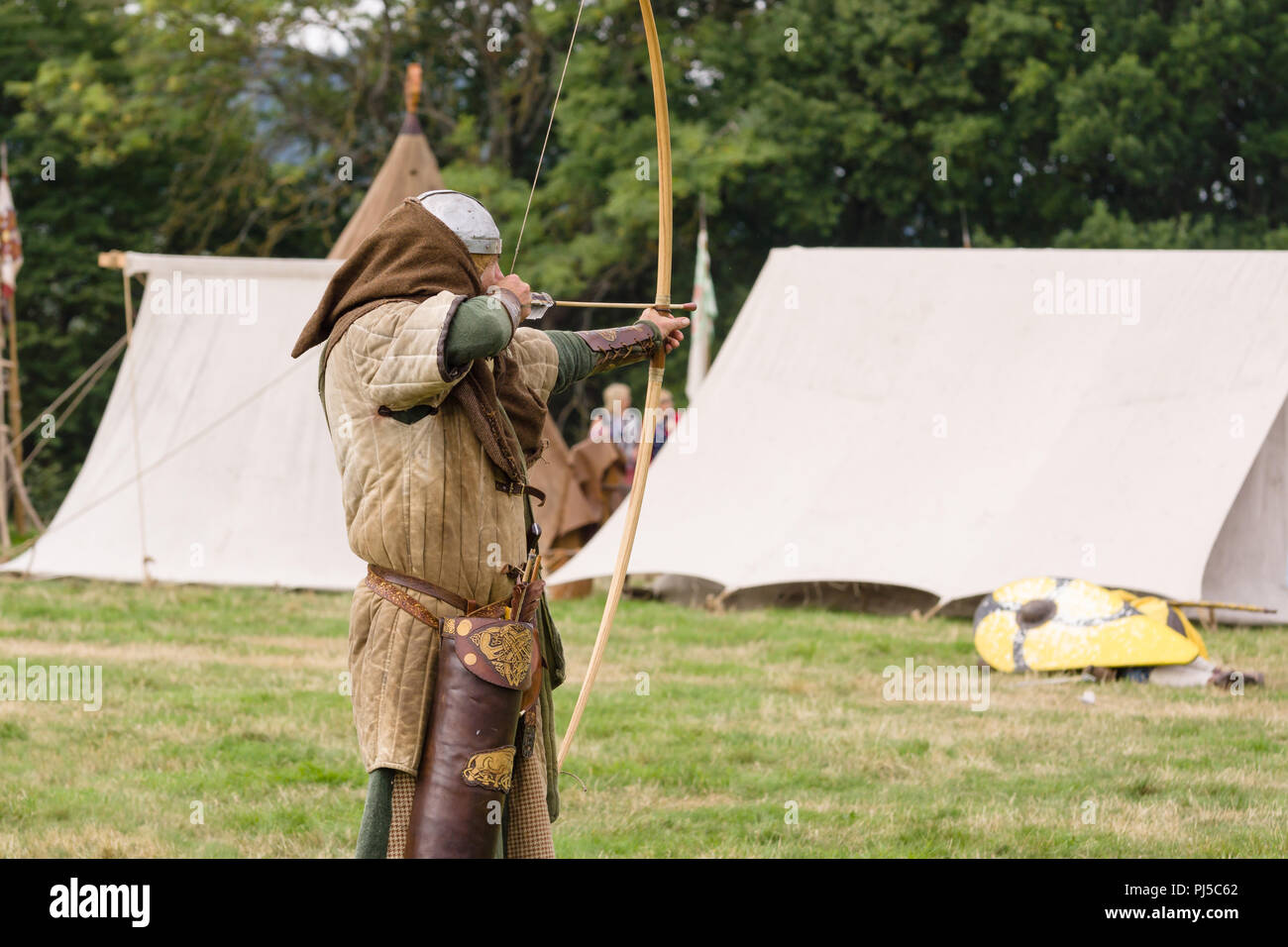 Medieval battle re-enactment showing archers of the Cwmwd Ial society re-enacting the battle of Crogen 1165 in Chirk North Wales 2018 Stock Photo