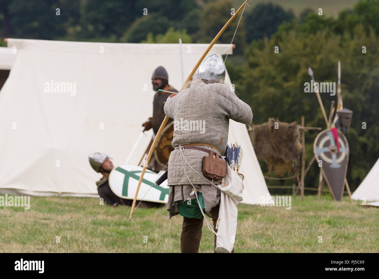 Medieval battle re-enactment showing archers of the Cwmwd Ial society re-enacting the battle of Crogen 1165 in Chirk North Wales 2018 Stock Photo