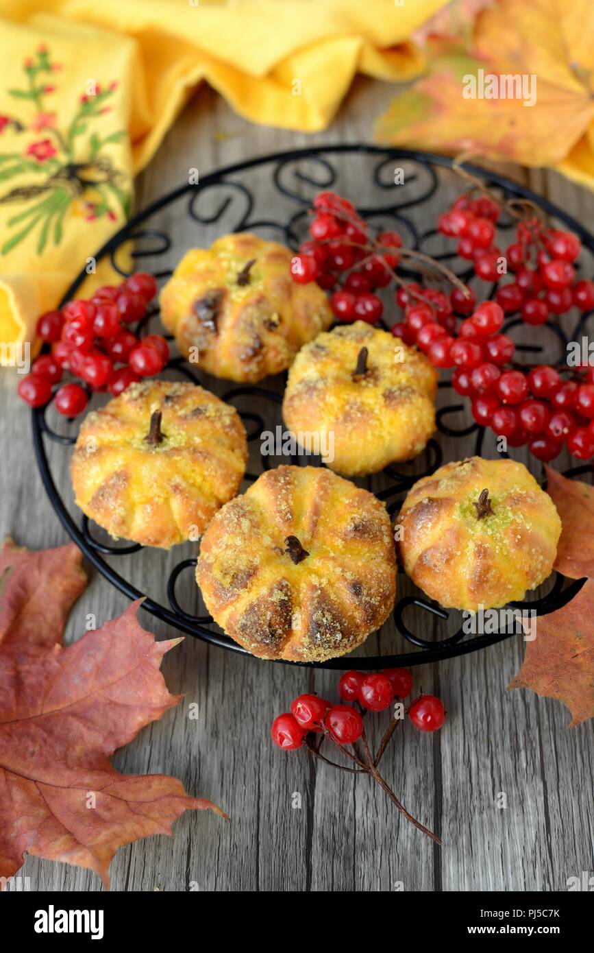 Pumpkin cookies with leaves and berries Stock Photo