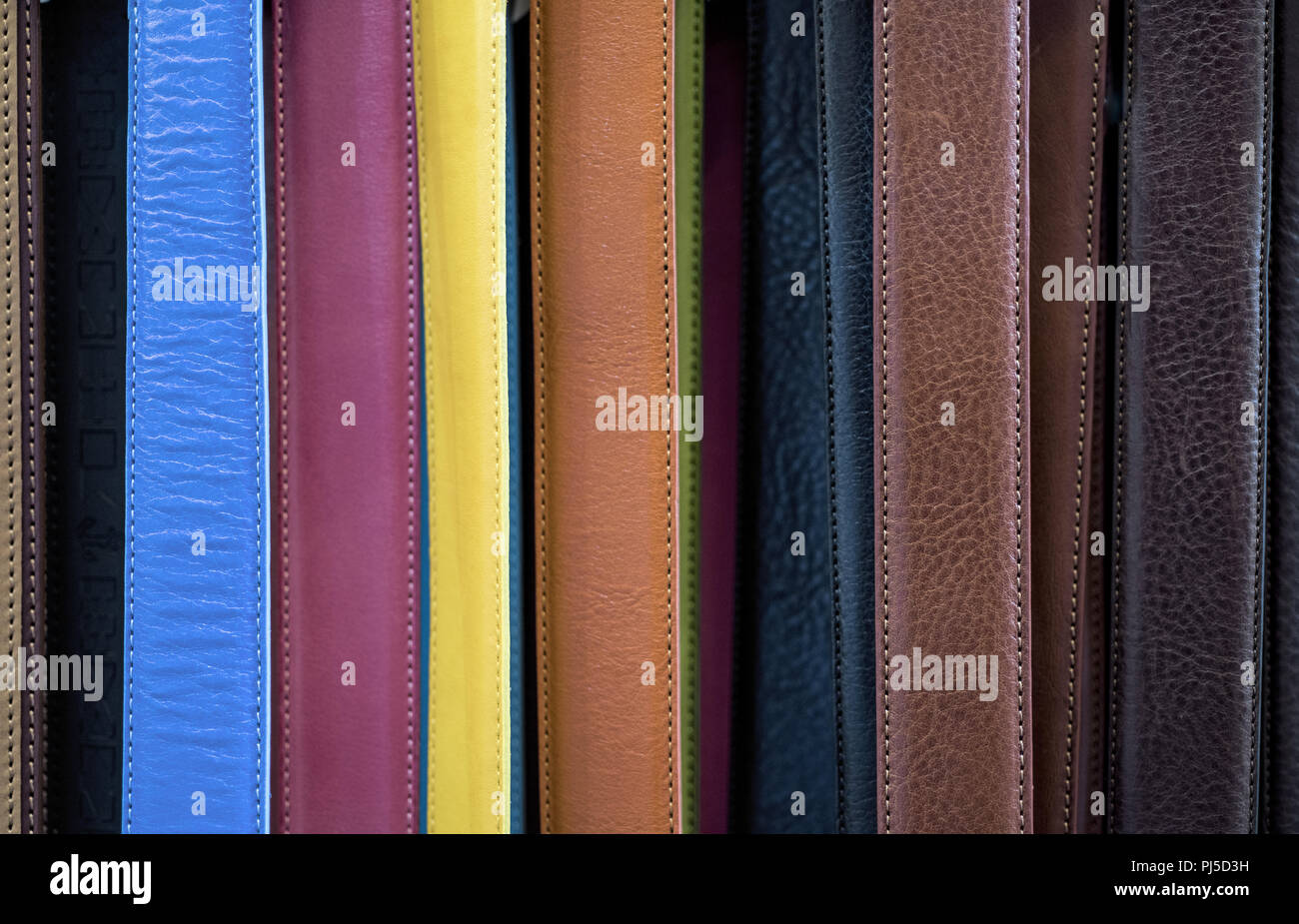 Abstract colored background made from leather belts Stock Photo