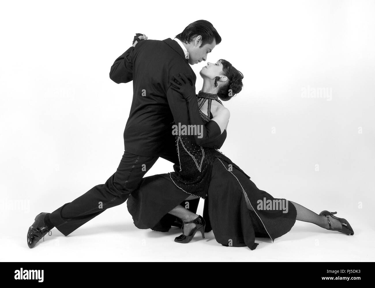 Professional dance teachers and tango dance masters from Buenos Aires demonstrating classic argentinian tango poses Stock Photo