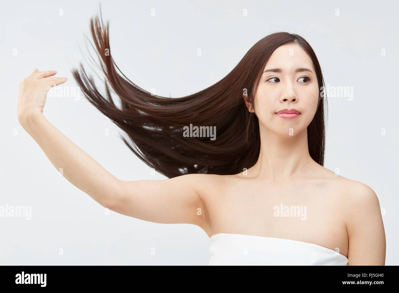 Japanese woman with silky hair Stock Photo - Alamy