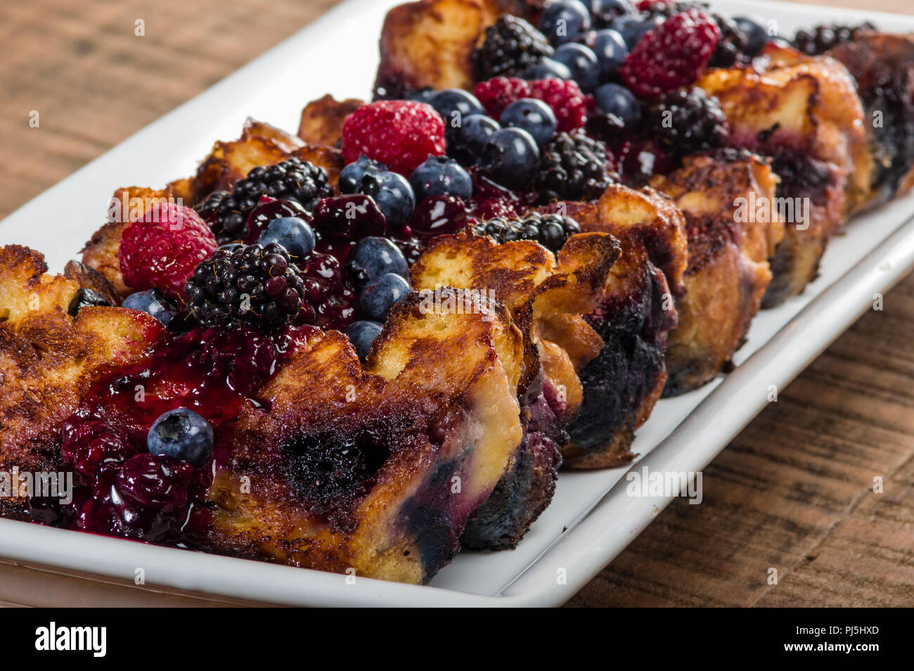 Bread pudding topped with fresh fruit Stock Photo
