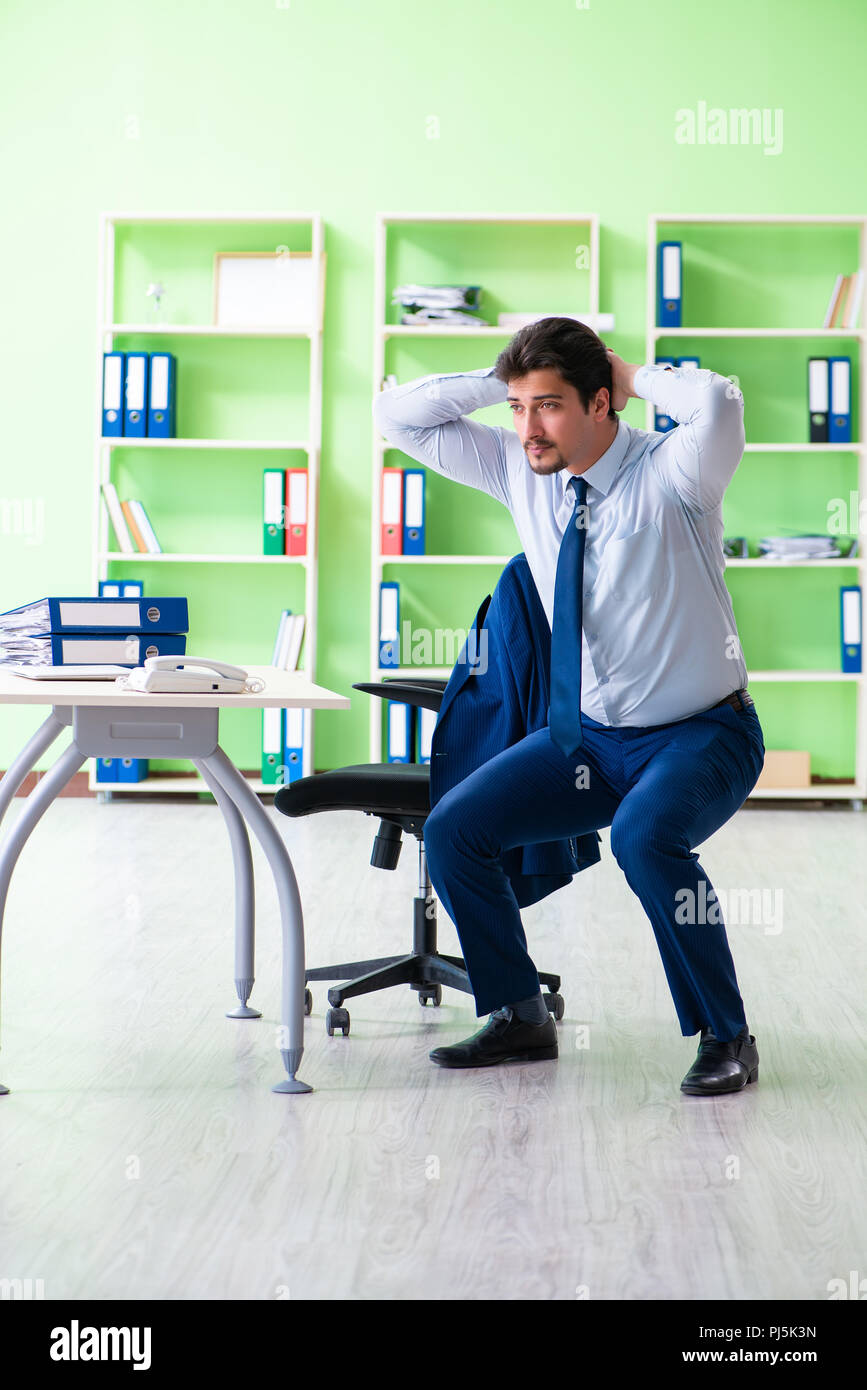 Work Training Session Break Employee doing exercises during break at work Stock Photo - Alamy