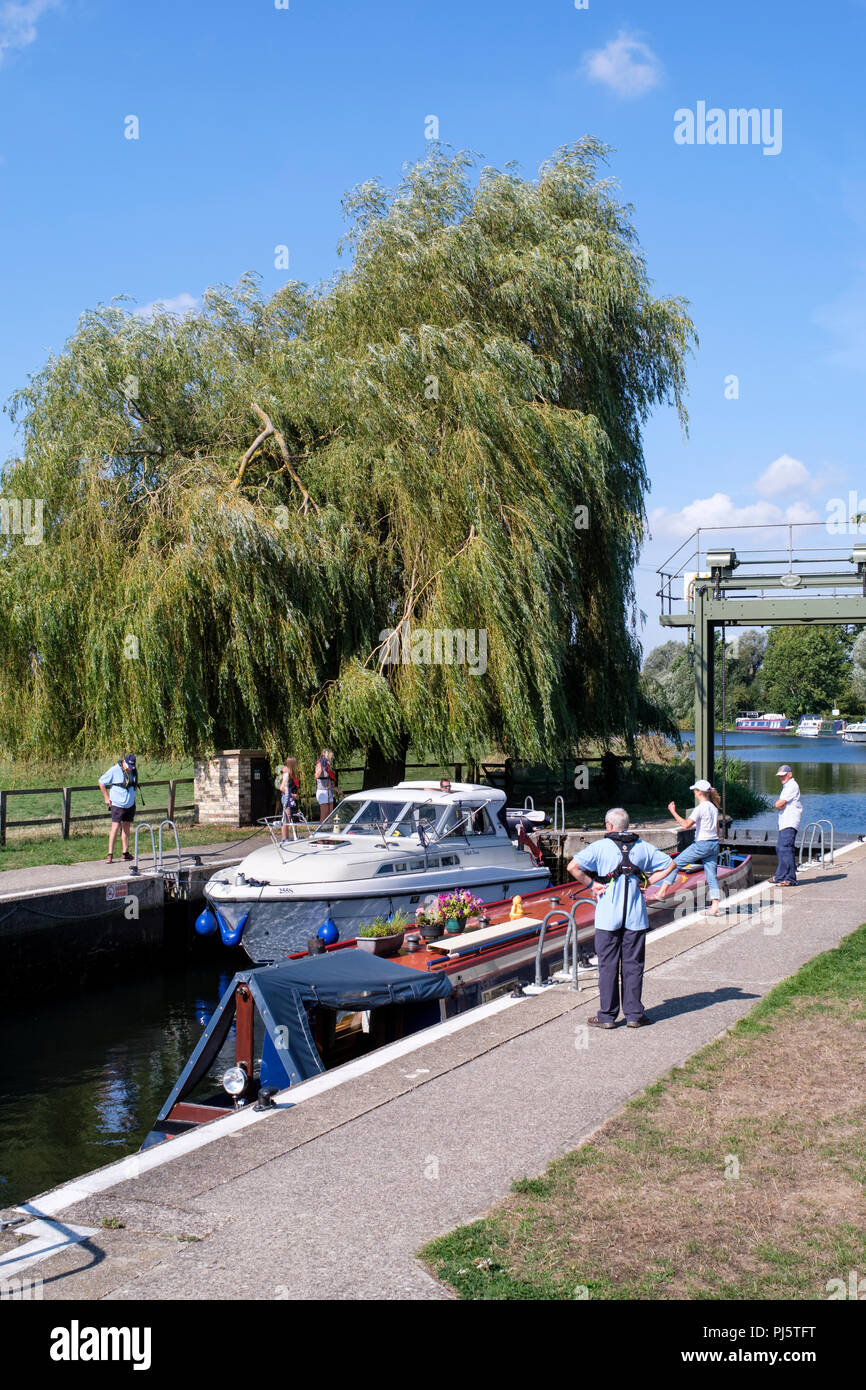 Boats passing through Houghton lock on the river Great Ouse, Mill Lane, Houghton and Wyton, Cambridgeshire, UK Stock Photo