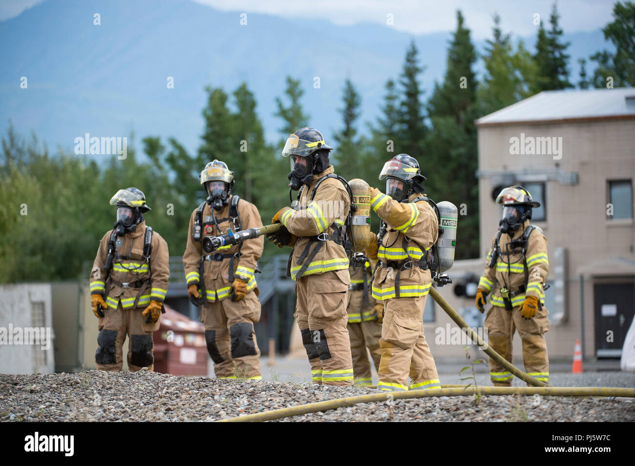 U.S. Air Force fire protection specialists assigned to the 673d Civil