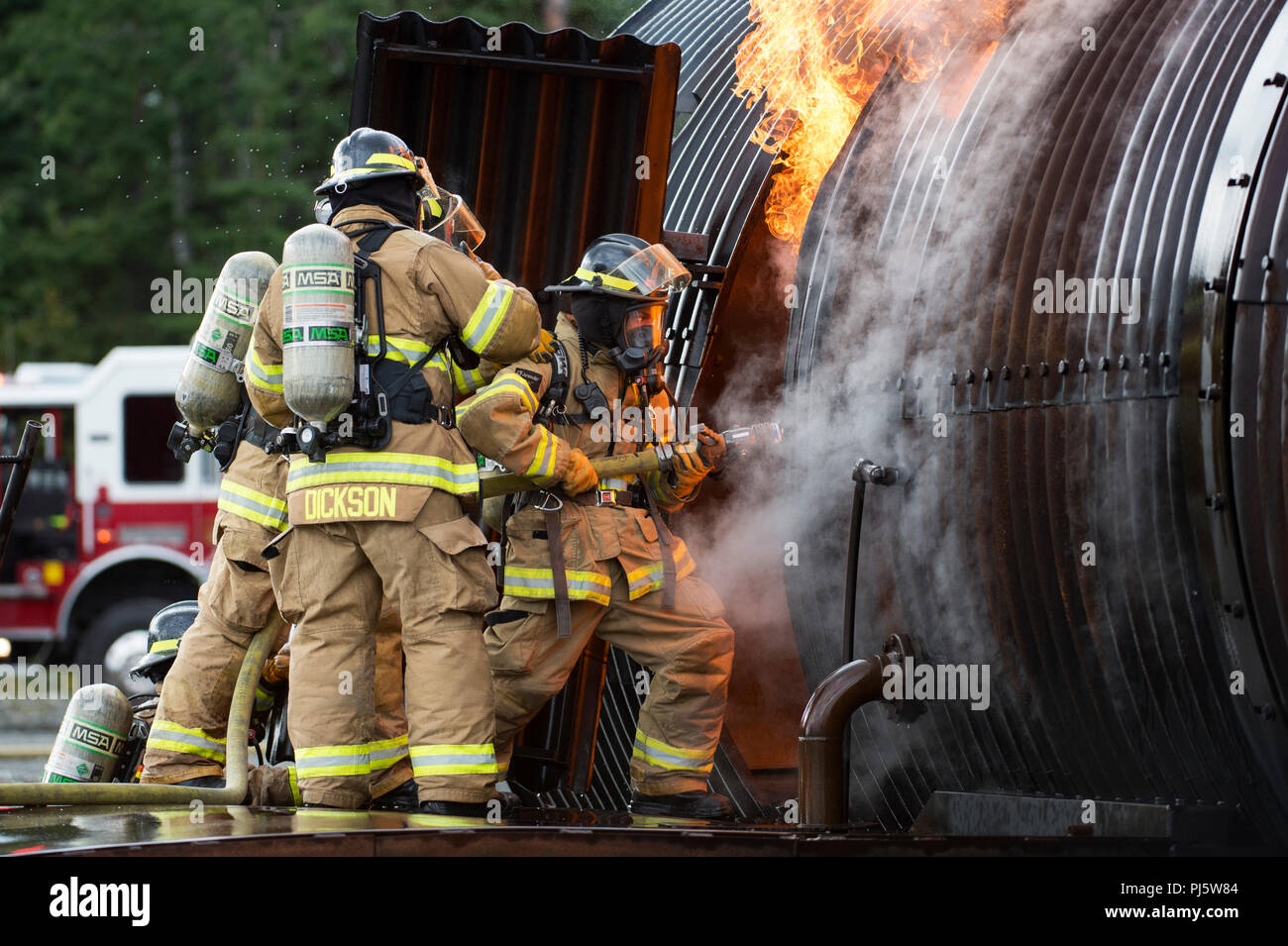 U.S. Air Force fire protection specialists assigned to the 673d Civil