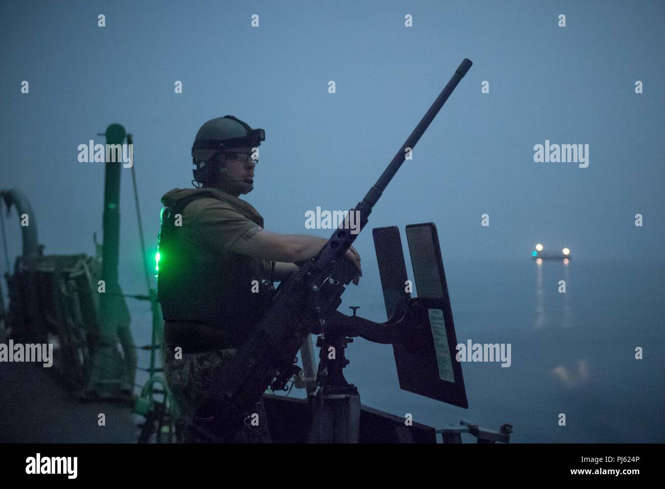 .50caliber machine gun aboard the guidedmissile destroyer USS Jason