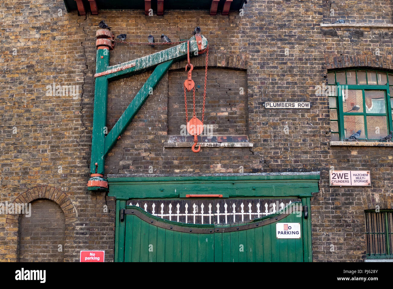 Gates and Hoist on The Whitechapel Bell Foundry Victorian warehouse on Plumbers Row, London Stock Photo