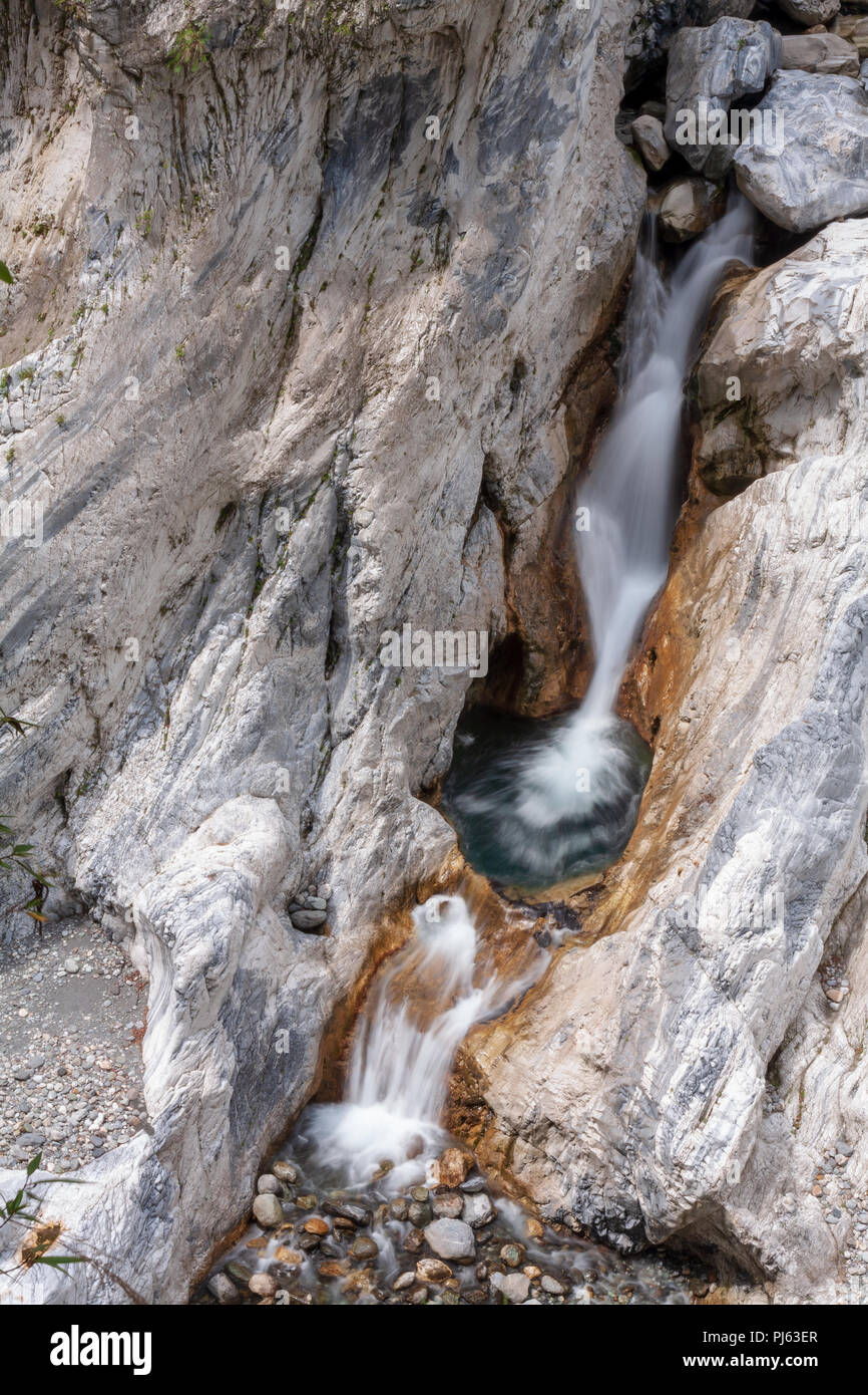 Narrow Kelan River, embranchment from the Liwu River, cascading down rock folds and marble cliffs, view from above, Tunnel of Nine Turns, Taroko Stock Photo