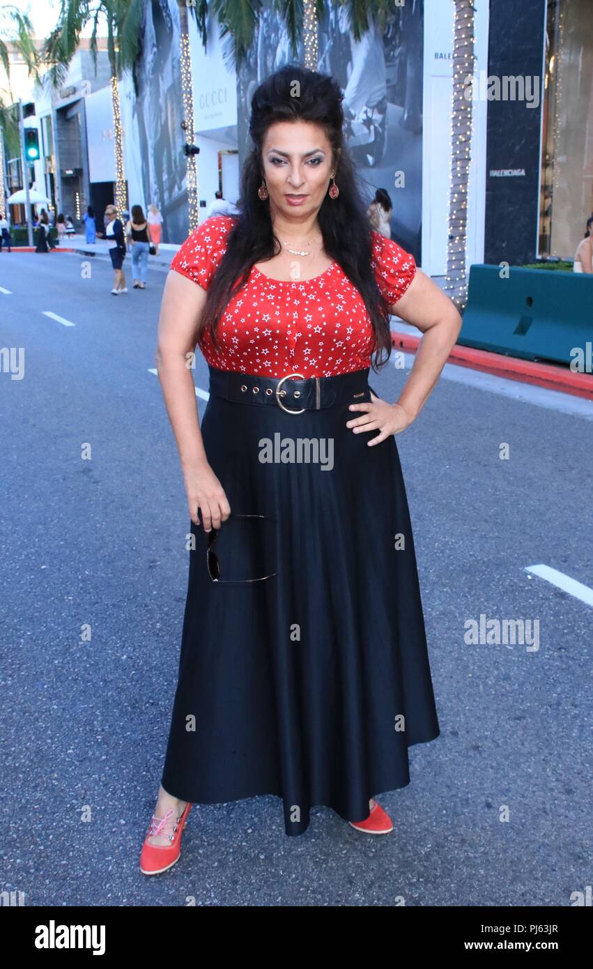 Alice Amter poses for a photoshoot at Rodeo Drive's 100 Year ...