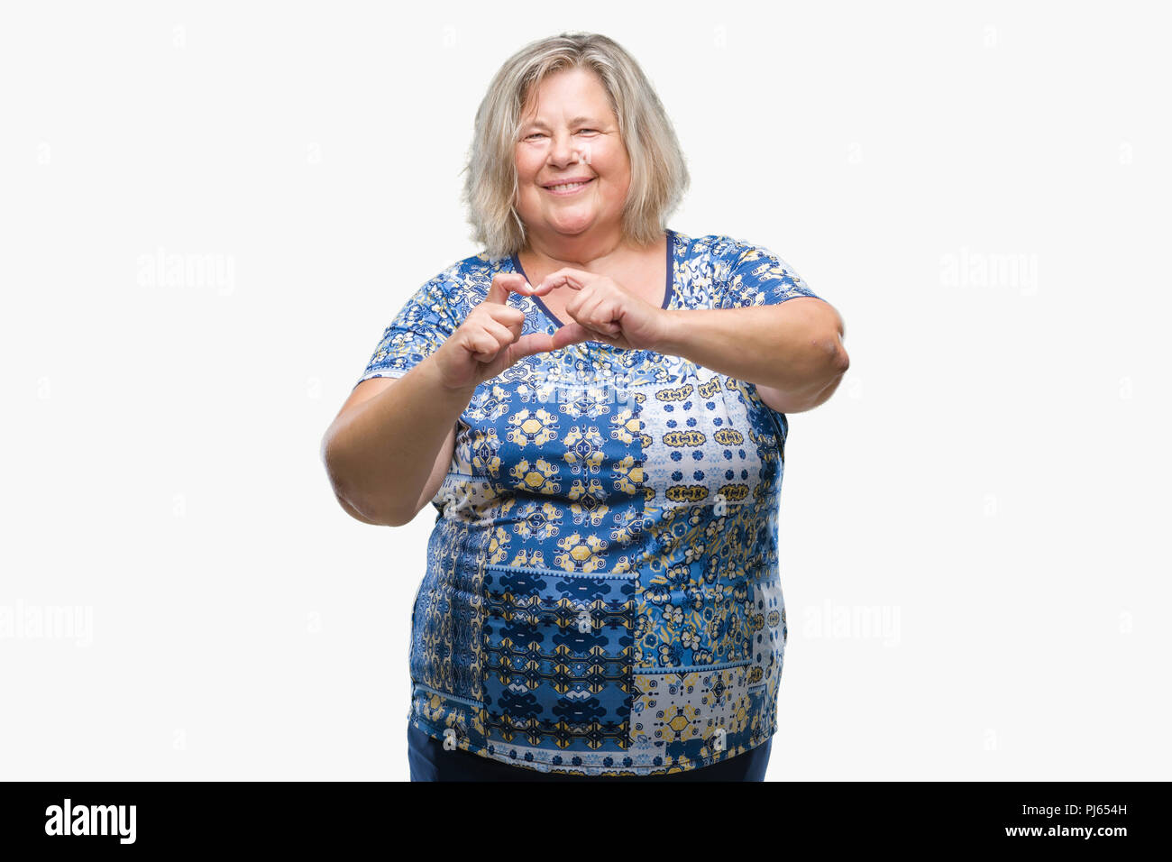 Senior plus size caucasian woman over isolated background smiling in ...