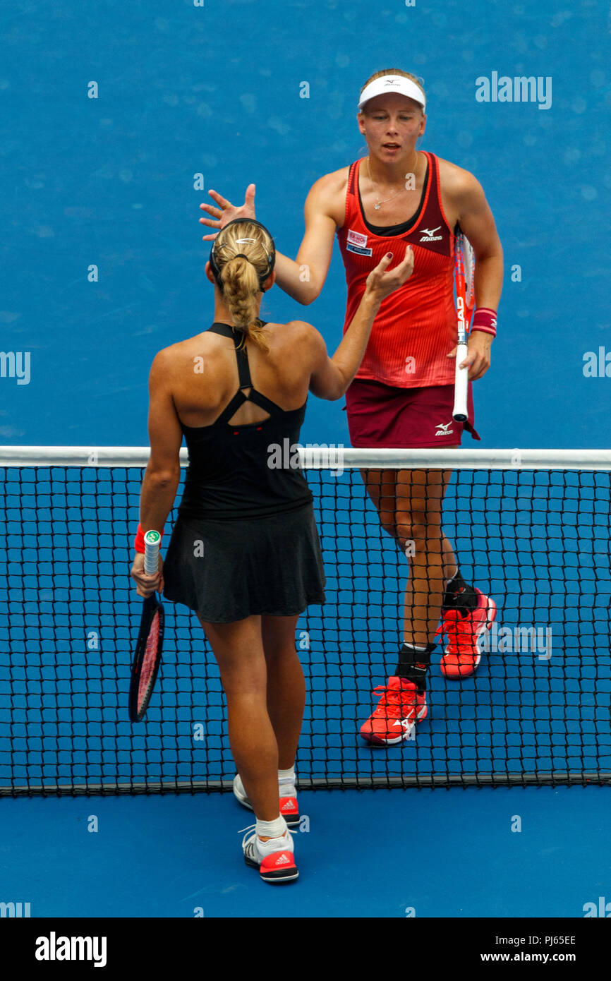 Angelique Kerber (GER) congratulates Johanna Larsson (SWE) at the 2018 US Open Tennis. Stock Photo