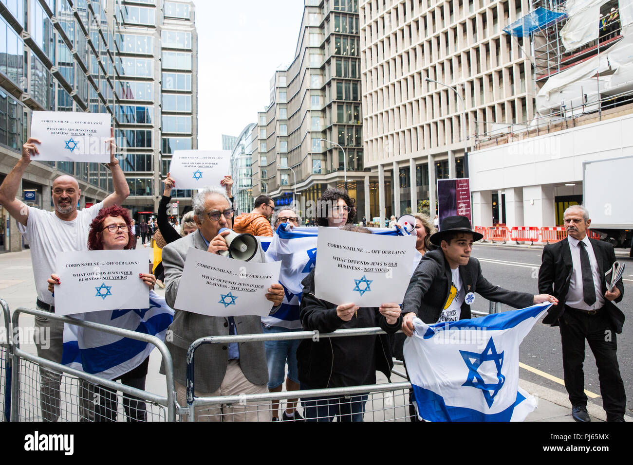 London, UK. 4th September, 2018. A group of around ten anti-Corbyn Jewish activists holds a counter-protest against supporters of Jeremy Corbyn from Jewish Voice for Labour, Momentum and other groups campaigning outside the headquarters of the Labour Party on the day on which the party NEC was expected to adopt the IHRA definition and examples of anti-Semitism. Credit: Mark Kerrison/Alamy Live News Stock Photo