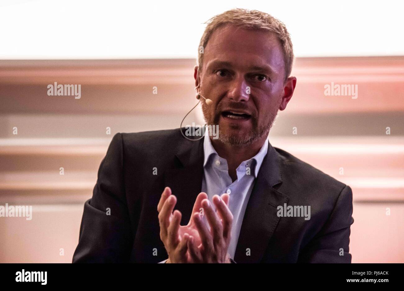 Munich, Bavaria, Germany. 4th Sep, 2018. CHRISTIAN LINDNER, the head of Germany's center-right FDP party (Freie Demokratische Partei, Free Democrats) made an appearance in Munich. As head of the FDP, Lindner is also a member of the German Bundestag. It was due to his decision to decline the terms of creating a coalition with Angela Merkel after the 2017 national elections that left Germany without a government for months until it created another coalition with the SPD. Lindner and Dr Michael Haberland of Mobil Deutschland discussed news strategies for mobility and infrastructure. A Stock Photo
