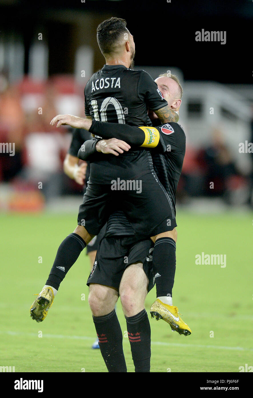 September 2, 2018 - Washington, DC, USA - 20180902 - D.C. United midfielder LUCIANO ACOSTA (10) celebrates with D.C. United forward WAYNE ROONEY (9), following his goal against Atlanta United FC in the first half at Audi Field in Washington. (Credit Image: © Chuck Myers/ZUMA Wire) Stock Photo