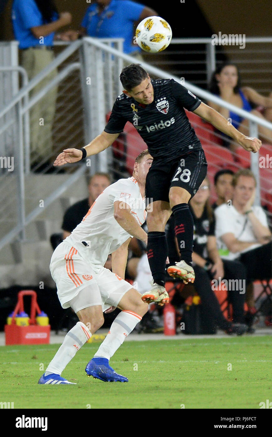 September 2, 2018 - Washington, DC, USA - 20180902 - D.C. United defender JOSEPH MORA (28) heads the ball against Atlanta United FC midfielder JULIAN GRESSEL (24) in the second half at Audi Field in Washington. (Credit Image: © Chuck Myers/ZUMA Wire) Stock Photo