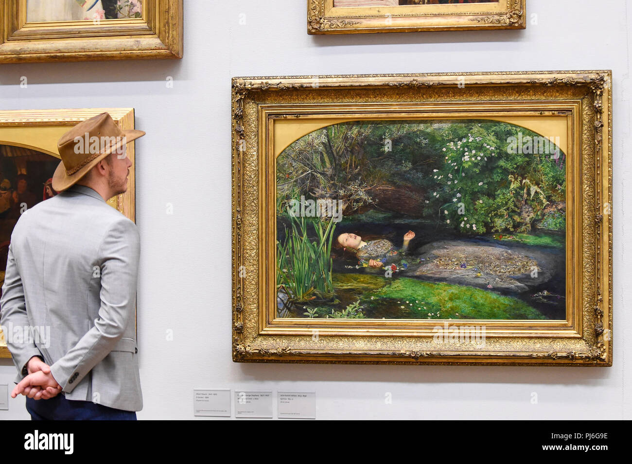London, UK.  5 September 2018.  A visitor views 'Ophelia', 1851-52, by John Everett Millais, at Tate Britain, ahead of the launch of a major new exhibition at the National Gallery of Australia (NGA) in December 2018.  Over forty Pre-Raphaelite works will be loaned by Tate to NGA, which have never been shown in Australia until now, including 'Ophelia', 1851-52, by John Everett Millais and 'The Lady of Shalott', 1888, by John William Waterhouse. Credit: Stephen Chung / Alamy Live News Stock Photo