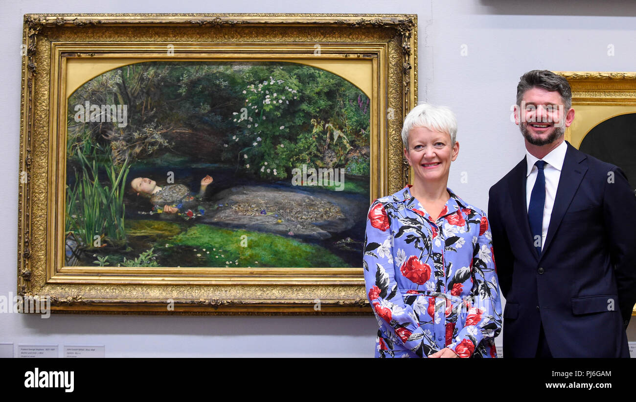 London, UK.  5 September 2018.  Maria Balshaw, Director of Tate, and Nick Mitzevich, Director of the National Gallery of Australia, pose with 'Ophelia', 1851-52, by John Everett Millais, at Tate Britain, to mark the launch of a major new exhibition at the National Gallery of Australia (NGA) in December 2018.  Over forty Pre-Raphaelite works will be loaned by Tate to NGA, which have never been shown in Australia until now, including 'Ophelia', 1851-52, by John Everett Millais and 'The Lady of Shalott', 1888, by John William Waterhouse. Credit: Stephen Chung / Alamy Live News Stock Photo