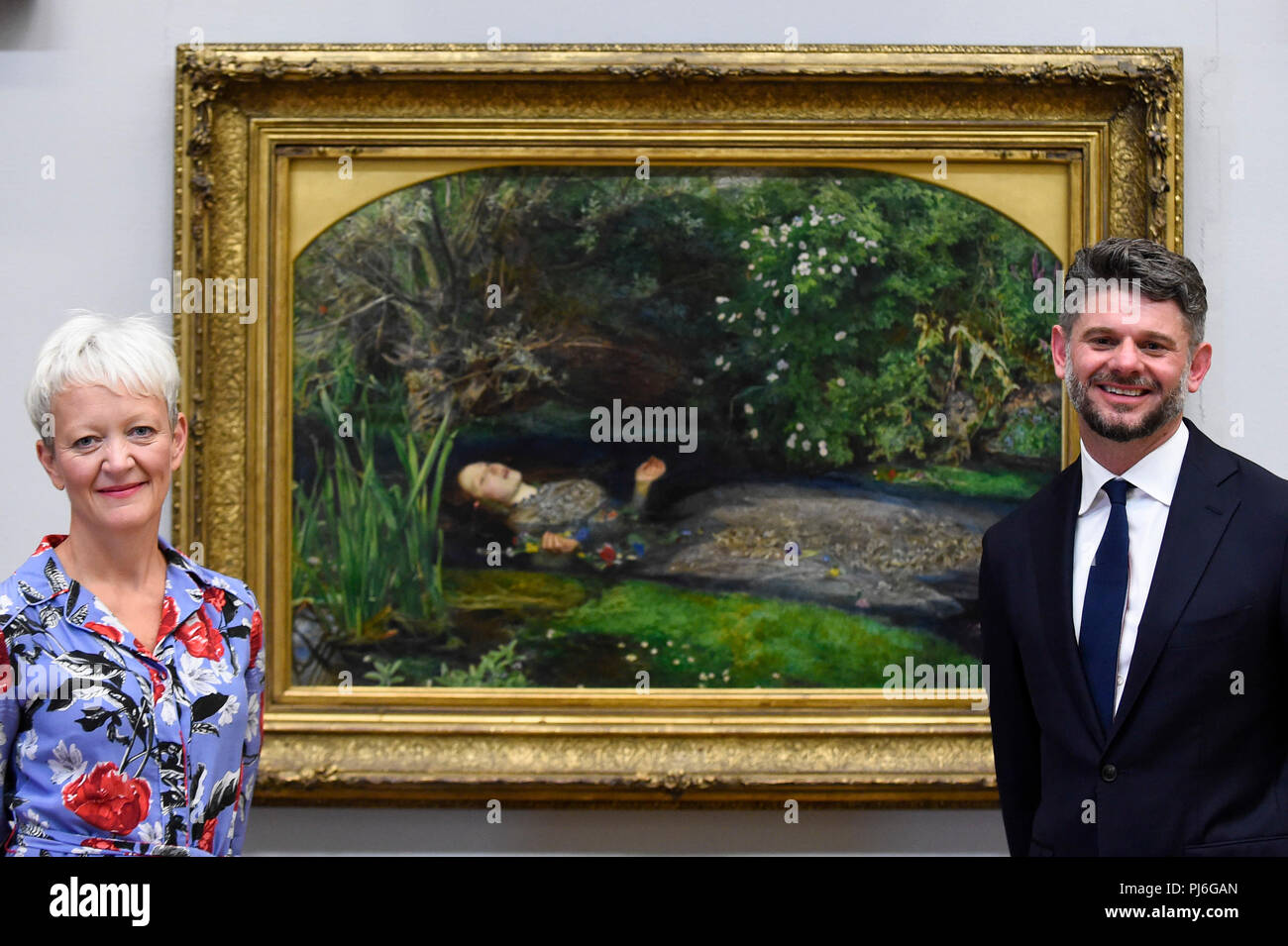 London, UK.  5 September 2018.  Maria Balshaw, Director of Tate, and Nick Mitzevich, Director of the National Gallery of Australia, pose with 'Ophelia', 1851-52, by John Everett Millais, at Tate Britain, to mark the launch of a major new exhibition at the National Gallery of Australia (NGA) in December 2018.  Over forty Pre-Raphaelite works will be loaned by Tate to NGA, which have never been shown in Australia until now, including 'Ophelia', 1851-52, by John Everett Millais and 'The Lady of Shalott', 1888, by John William Waterhouse. Credit: Stephen Chung / Alamy Live News Stock Photo