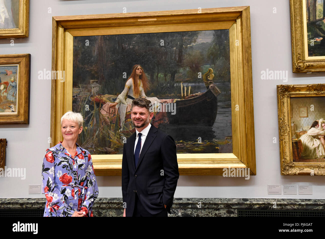 London, UK.  5 September 2018.  Maria Balshaw, Director of Tate, and Nick Mitzevich, Director of the National Gallery of Australia, pose with 'The Lady of Shalott', 1888, by John William Waterhouse, at Tate Britain, to mark the launch of a major new exhibition at the National Gallery of Australia (NGA) in December 2018.  Over forty Pre-Raphaelite works will be loaned by Tate to NGA, which have never been shown in Australia until now, including 'Ophelia', 1851-52, by John Everett Millais and 'The Lady of Shalott', 1888, by John William Waterhouse. Credit: Stephen Chung / Alamy Live News Stock Photo