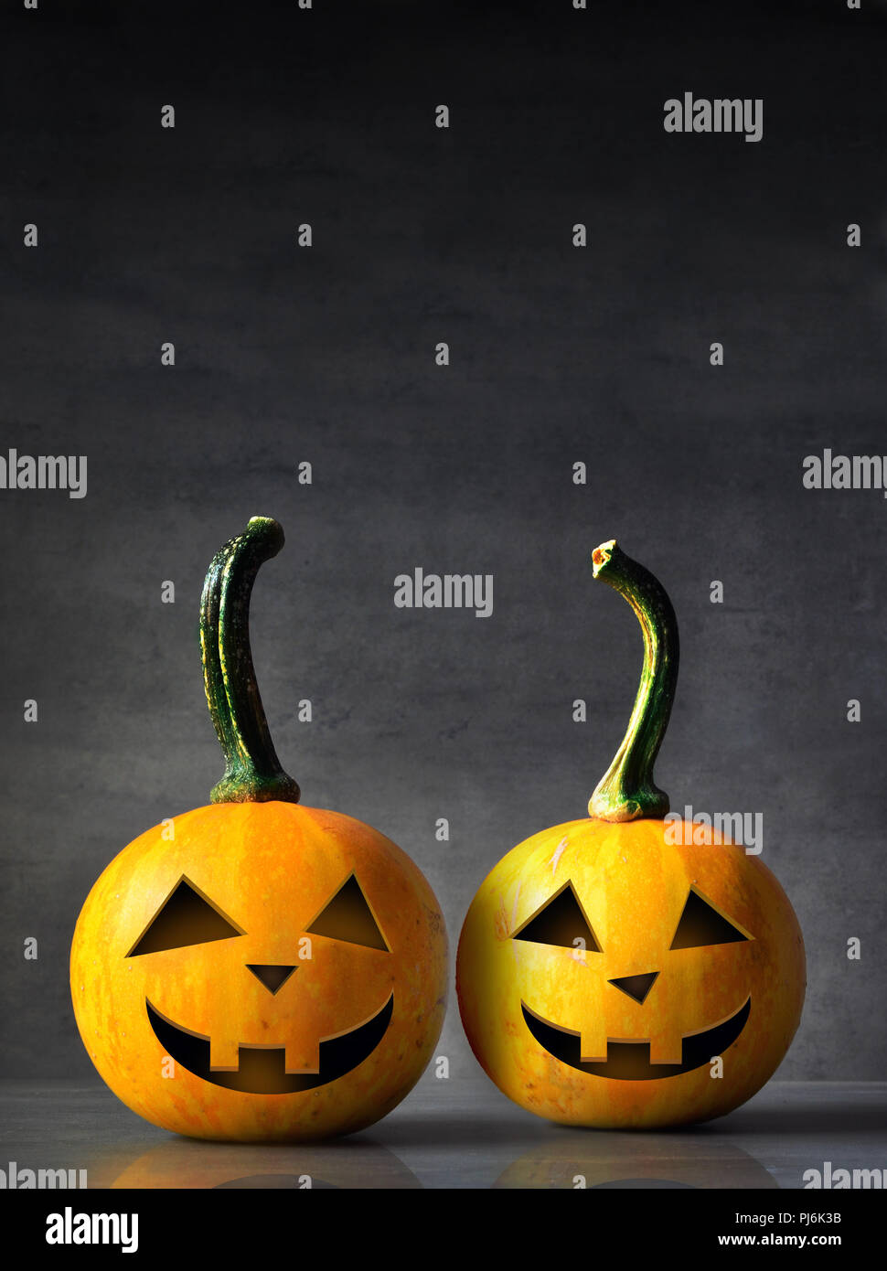 Scary Halloween pumpkins isolated on a black background. Scary smiling ...