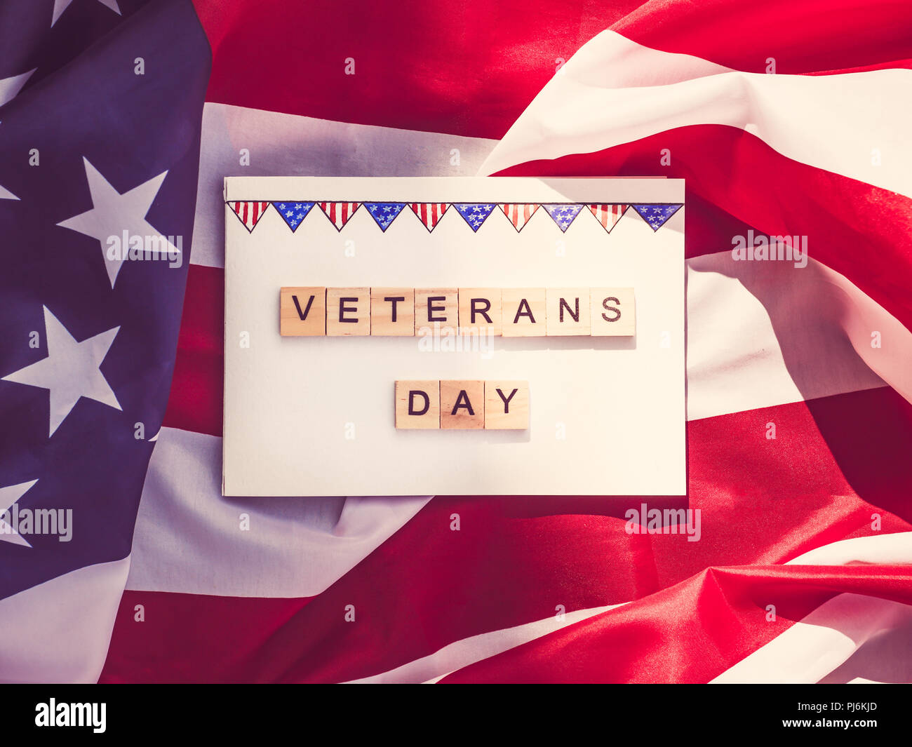 Notepad with blank page, wooden letters of the alphabet in the form of ...