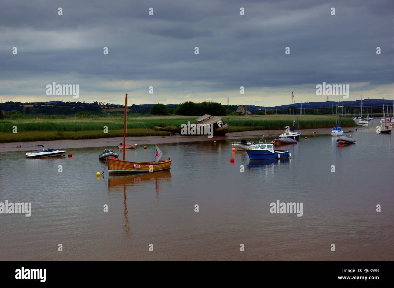 Fishing boats anchored in river hires stock photography and images Alamy