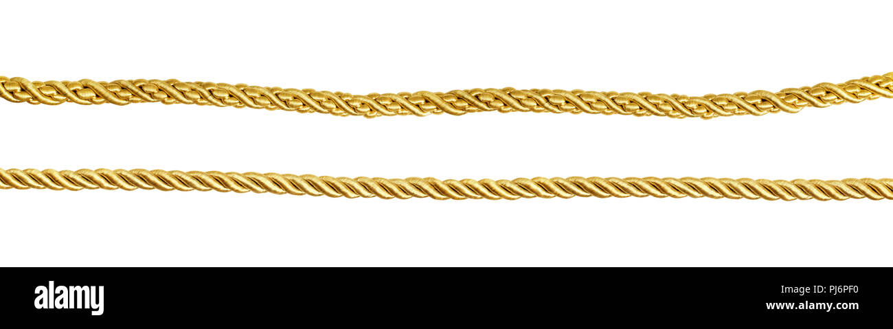 Set of golden silk ropes isolated on white Stock Photo