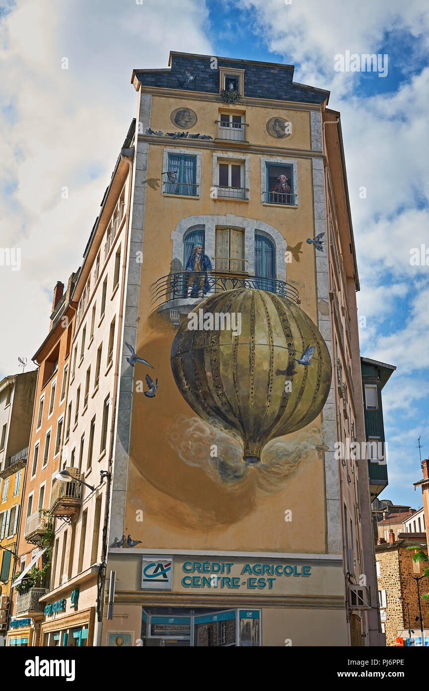 The world's first balloon flight by the Mongolfier brothers is depicted as artwork on buildings in Annonay, Ardeche department, France. Stock Photo