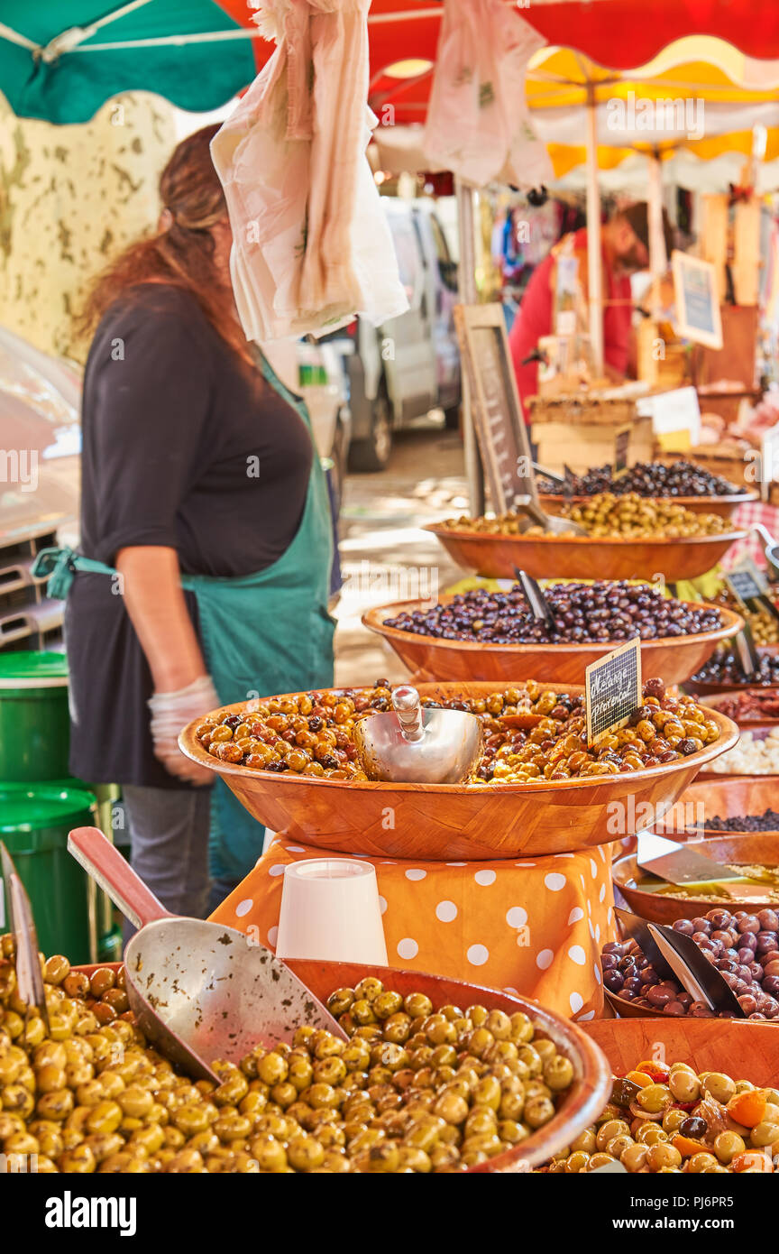 Market stall selling olives in the Ardeche town of Lamstre Stock Photo