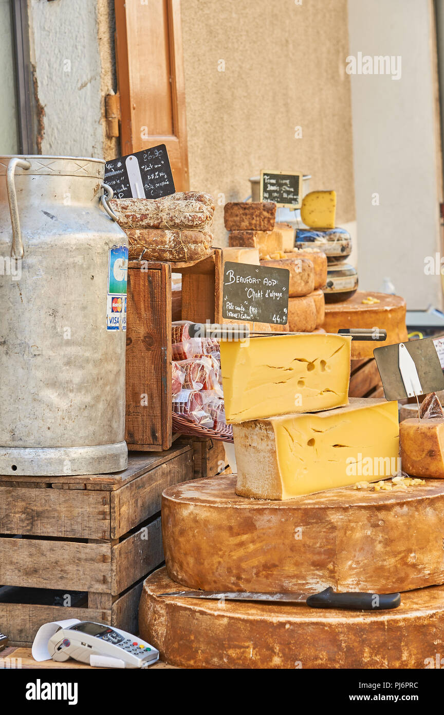 Stall selling cheese at the weekly market in the town of Lamastre, Ardeche, Rhone Alps region of France Stock Photo