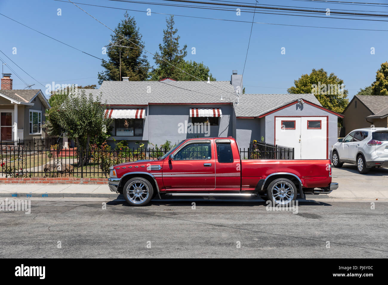 Pickup truck parked in front of home; Sunnyvale, California Stock Photo