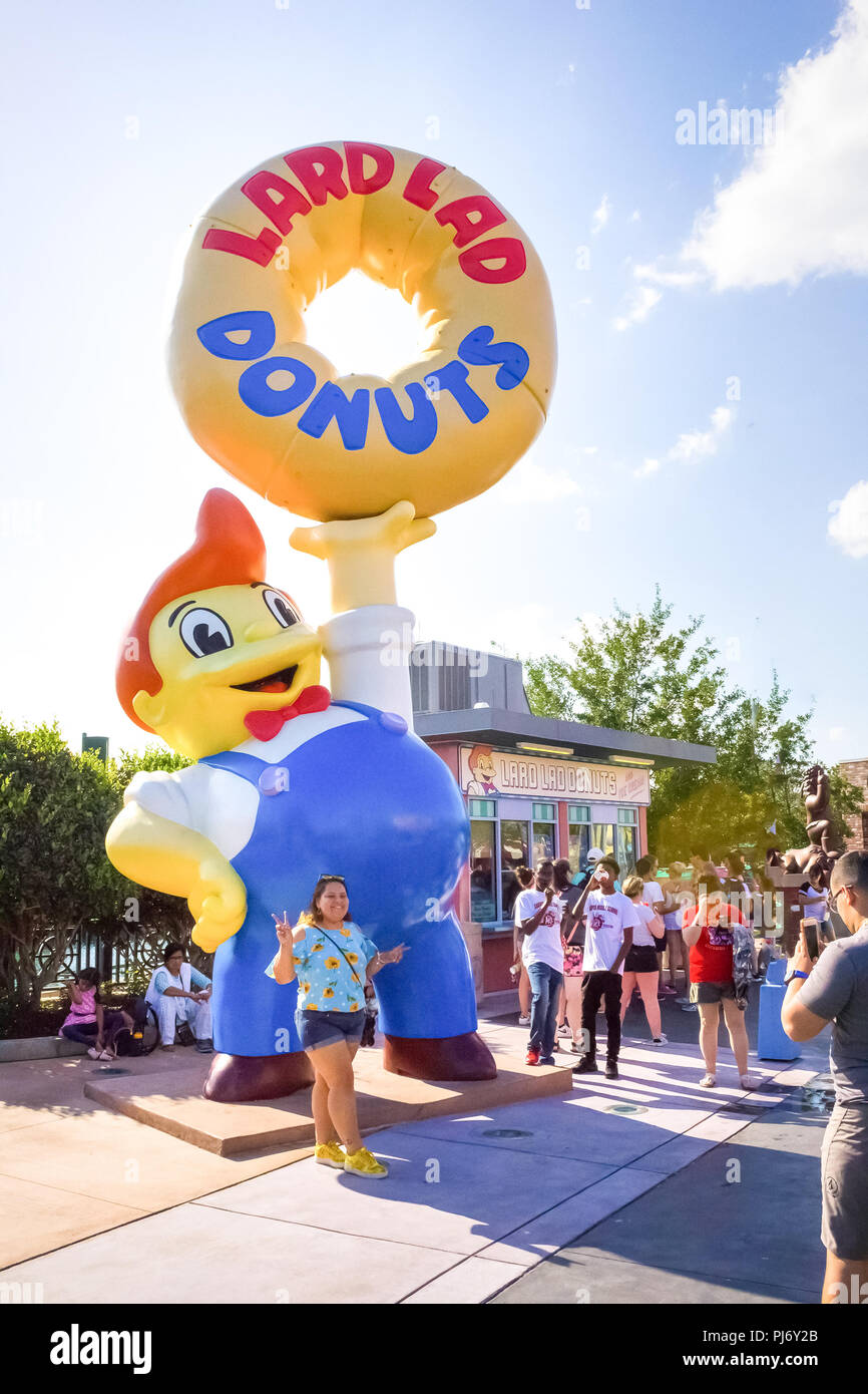 Orlando, Florida, USA - May 10, 2018: The man making photo at park Universal Studios. Orlando is a theme park resort in Orlando, Florida. Stock Photo