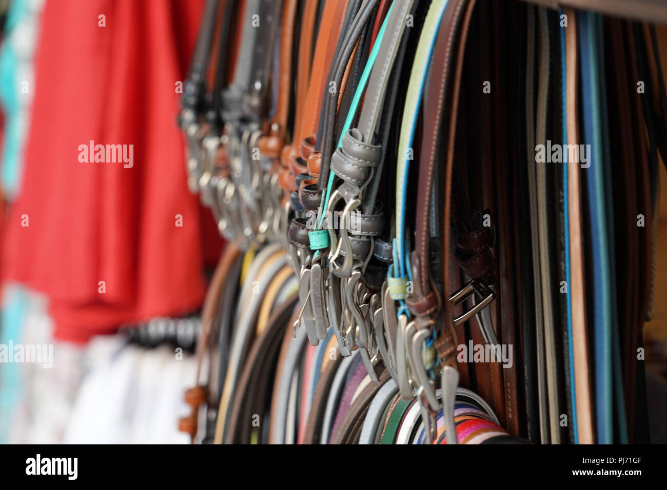 different colors leather belt on display at the market for sale Stock ...