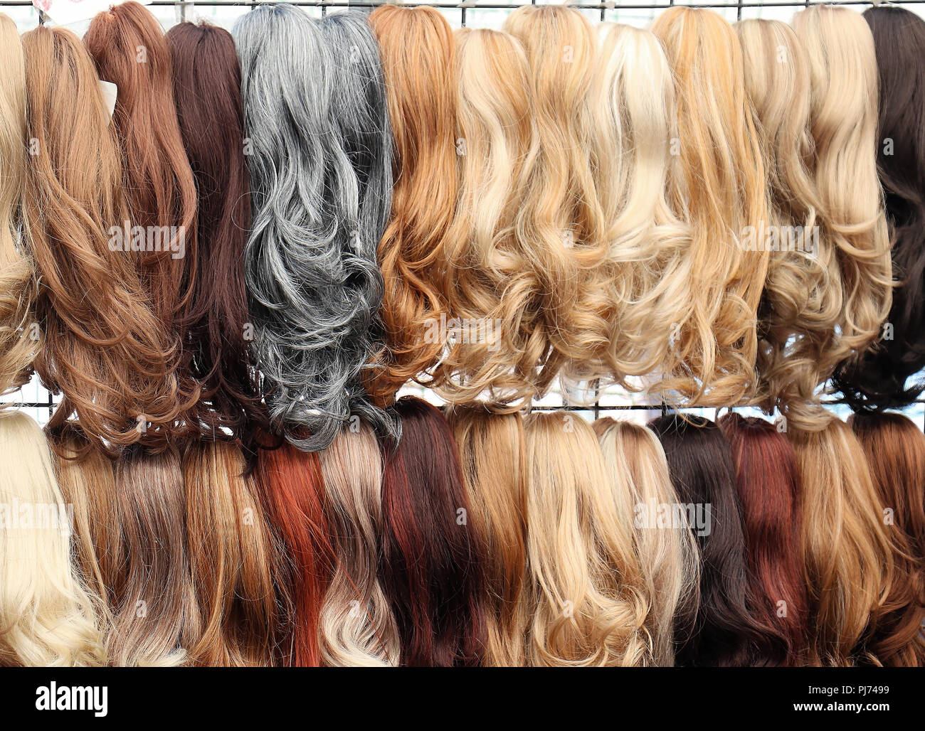 Glam Female Hair Extensions In Different Colors And Styles