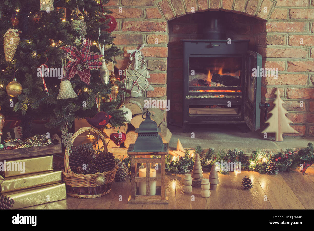 Decorated Fireplace With Woodburner Lit Up Christmas Tree With