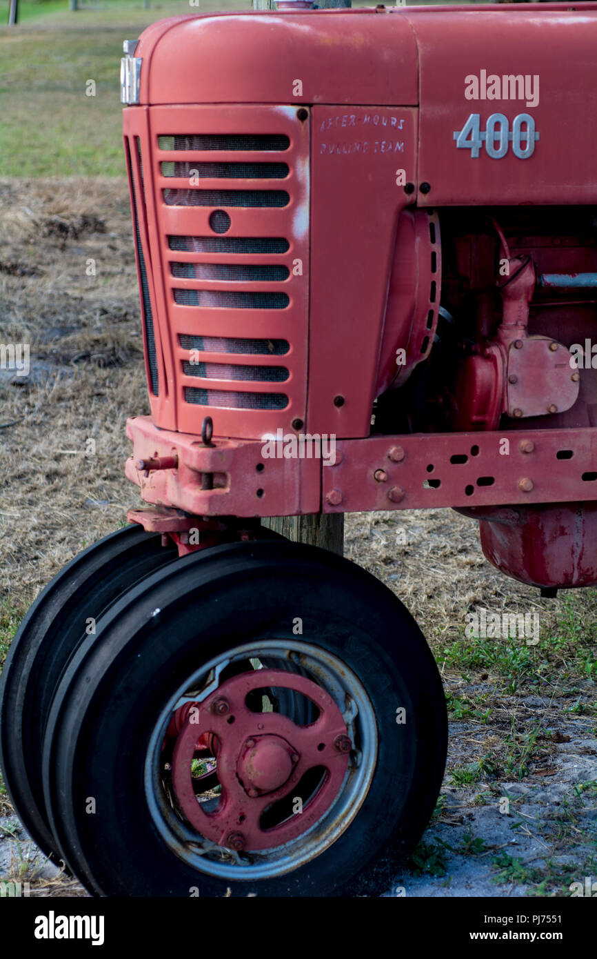 old antique red tractor Stock Photo