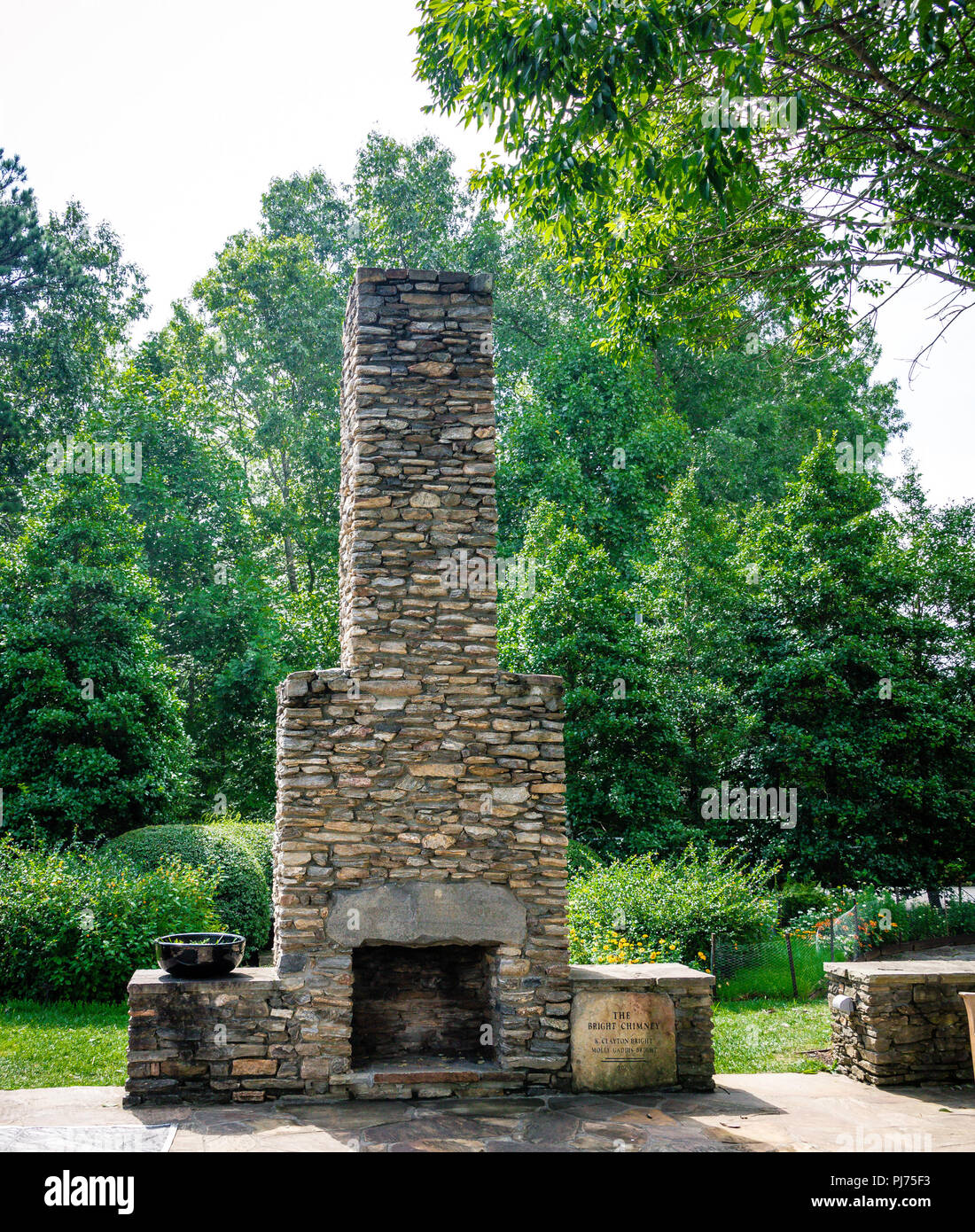 An Old Stone Fireplace In An Outdoor Garden Stock Photo 217746231