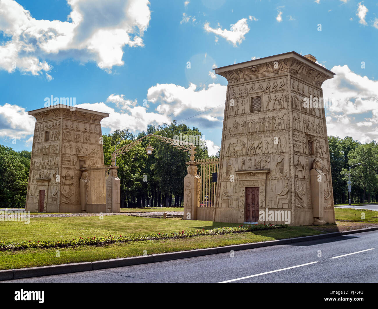 Gates in the Egyptian style in the form of truncated pyramids at the entrance to Tsarskoe Selo in St. Petersburg Stock Photo