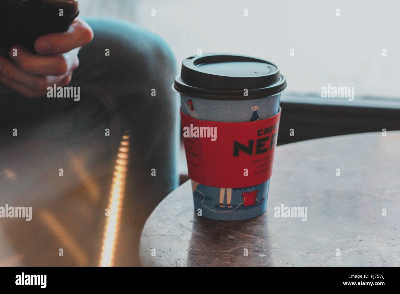 Coffee cup on table Stock Photo Alamy