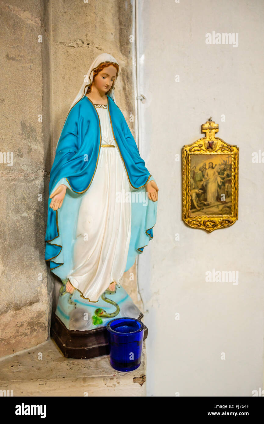 Small Maria sculpture in the Church of All Saints in the village of Nunney in Somerset, England, UK Stock Photo