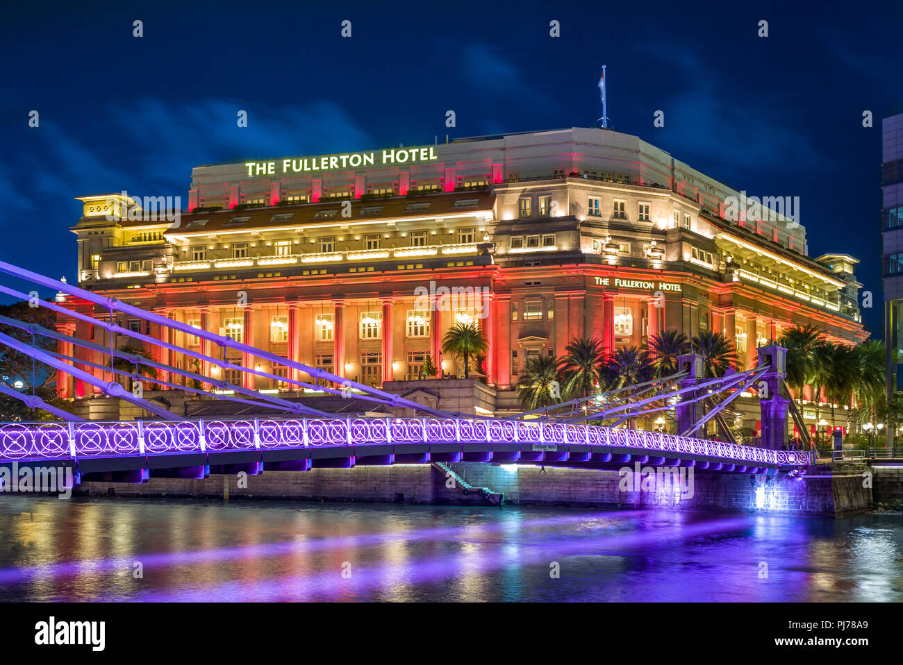 Singapore - August 8, 2018: The Fullerton Hotel Singapore is a five-star luxury hotel located near the mouth of the Singapore River Stock Photo