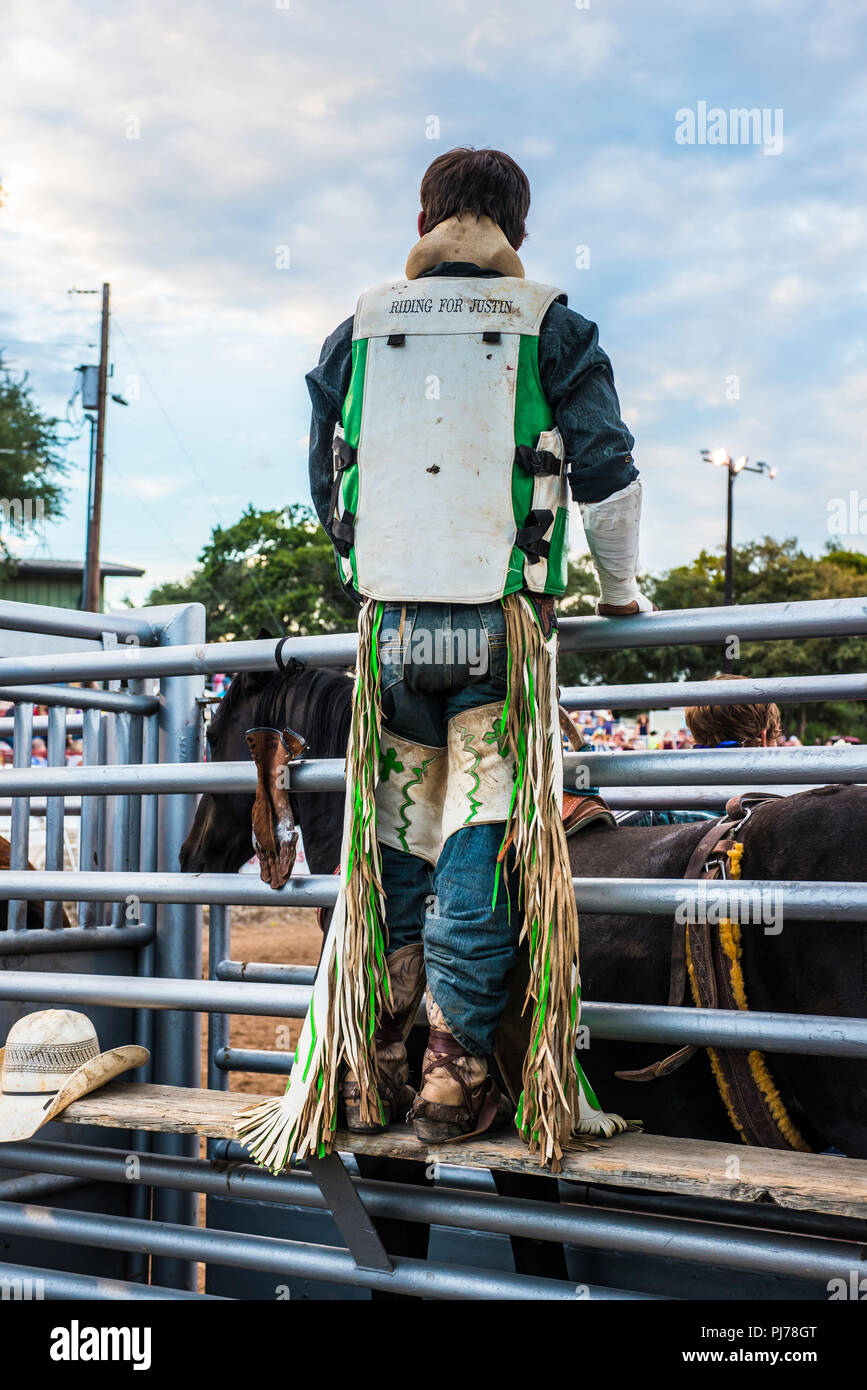 Cowboy gearing up for Texas rodeo USA Stock Photo
